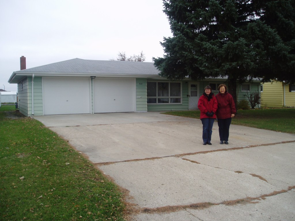 My host Mum and me, outside the family home