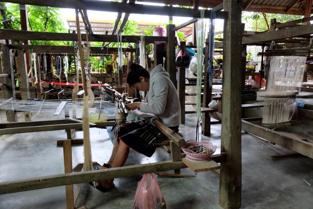 Woman weaving at Ban Xang Khong
