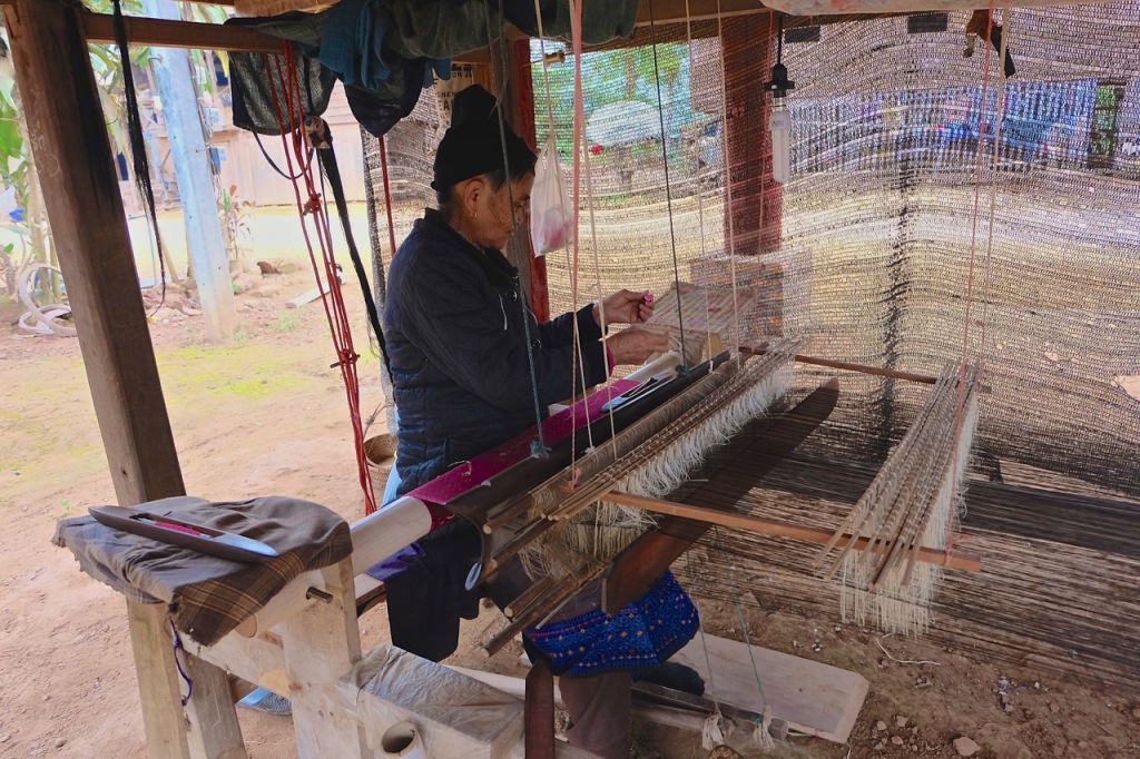 Weaver and her traditional loom, photo taken near Luang Namtha