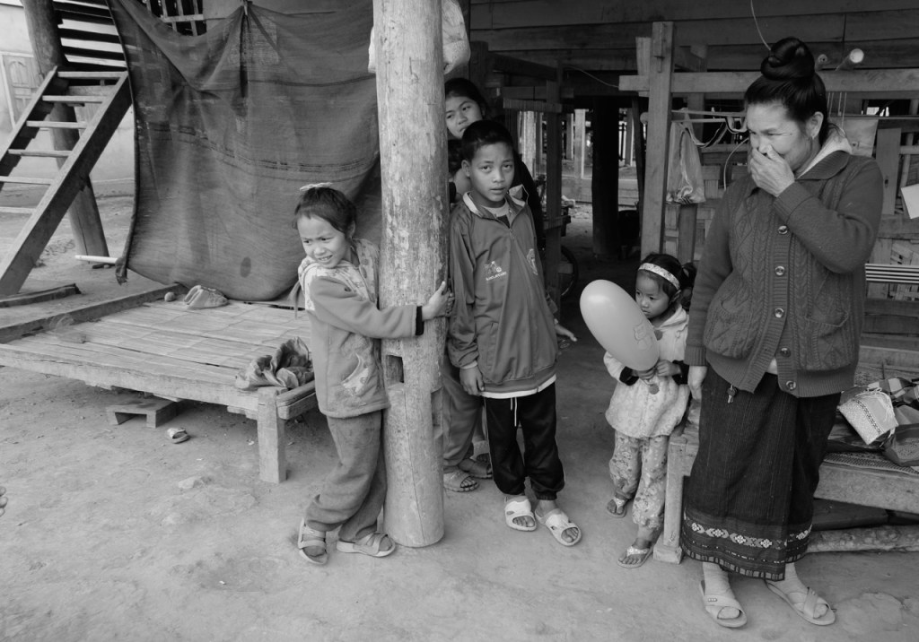 Woman and her family enjoying a joke Woman and her family enjoying a joke